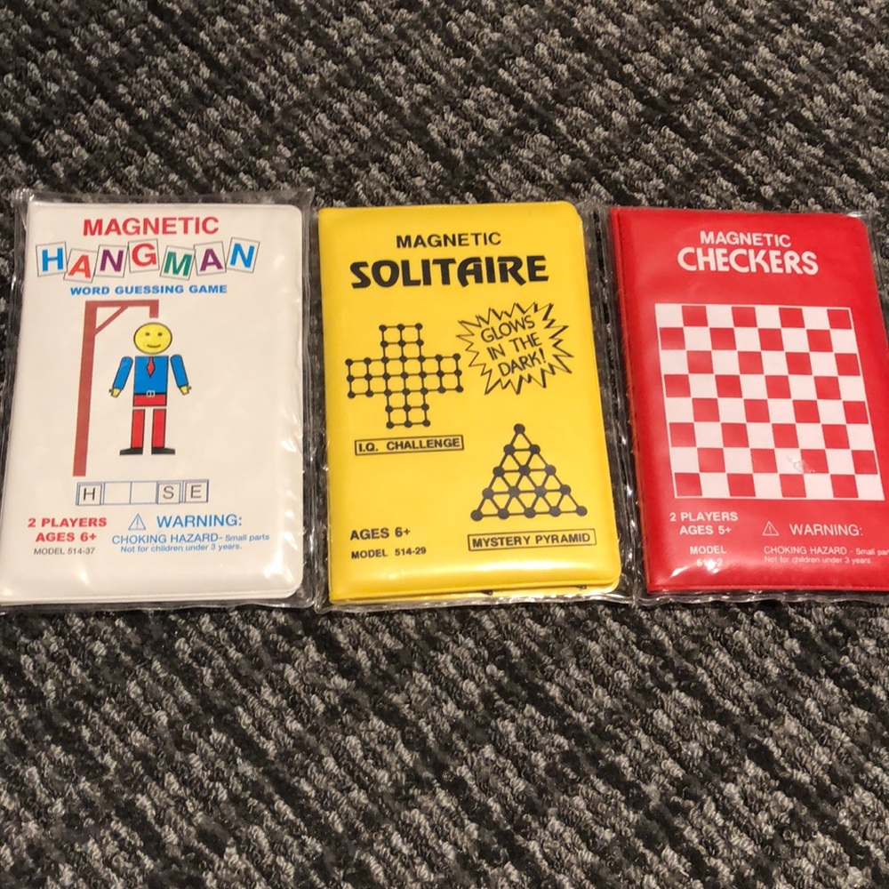 Magnetic travel size games. Hangman checkers, and Solitaire.